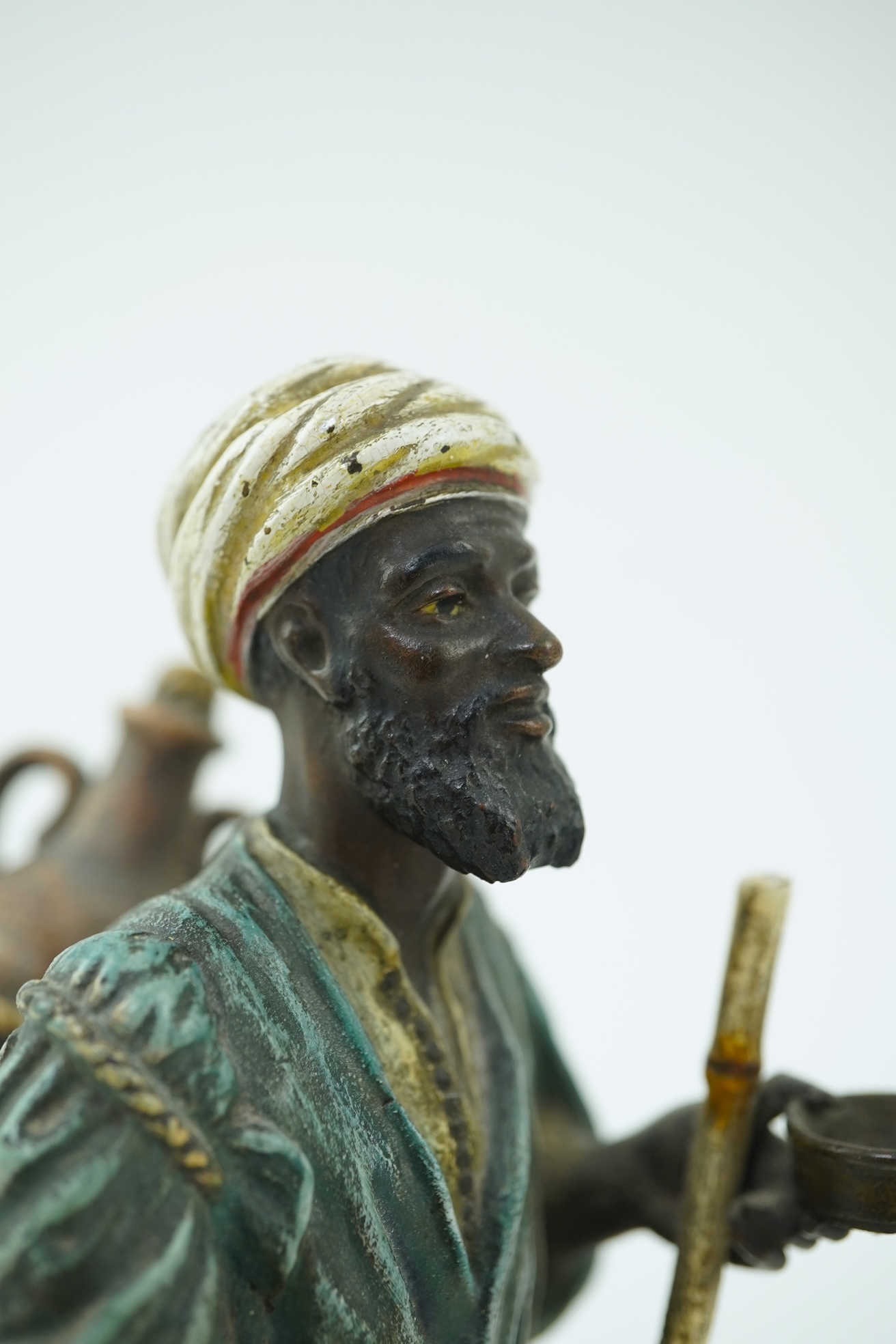 Franz Xavier Bergman (Austrian, 1861-1936). A Viennese cold painted bronze figure of a North African street vendor